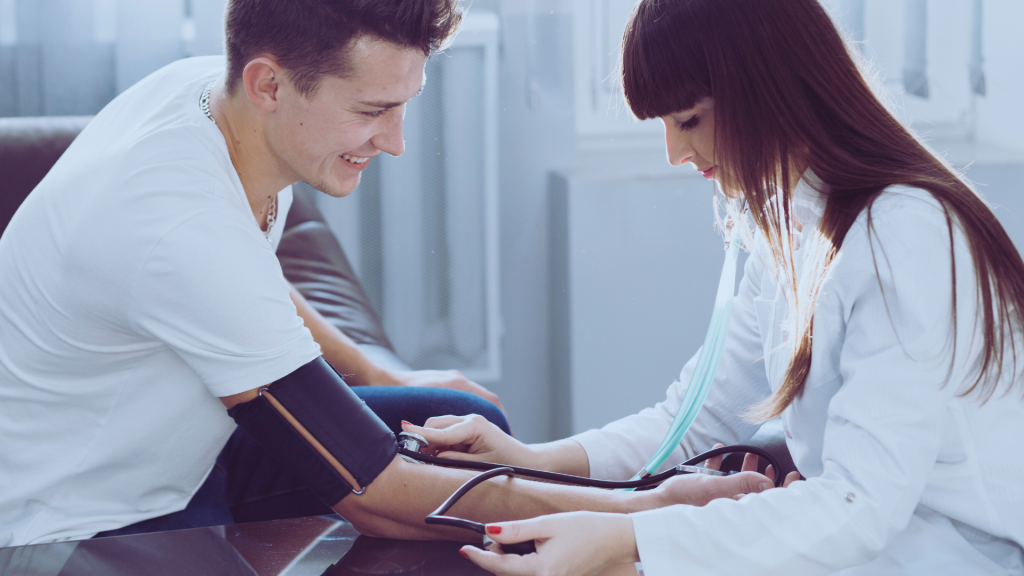 A Medical Professional at an Ibogaine Clinic Taking Patient Vitals