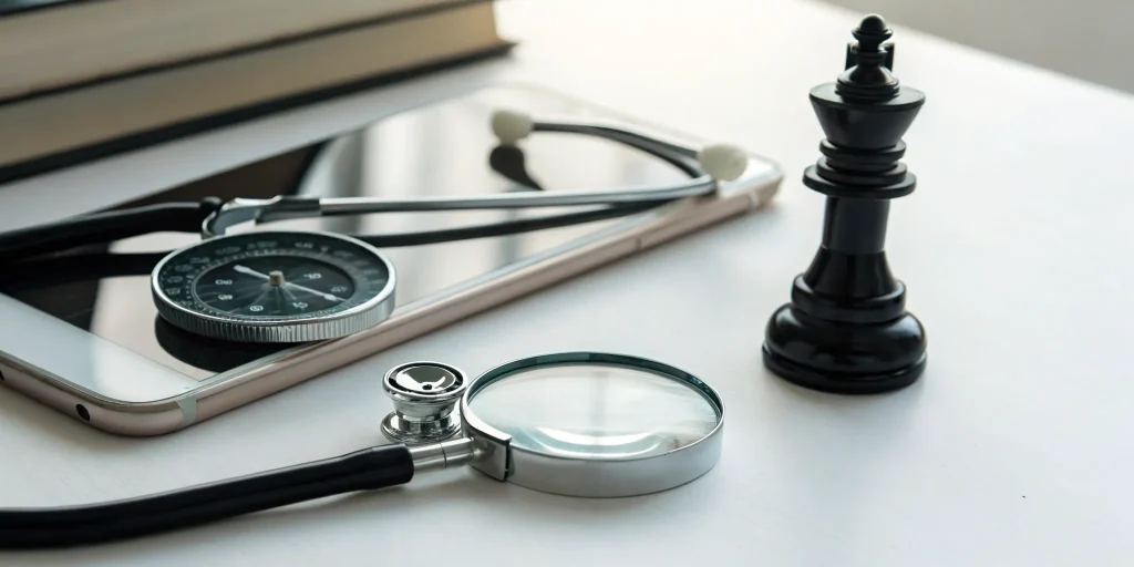 Medical device marketing strategy with stethoscope and smartphone.